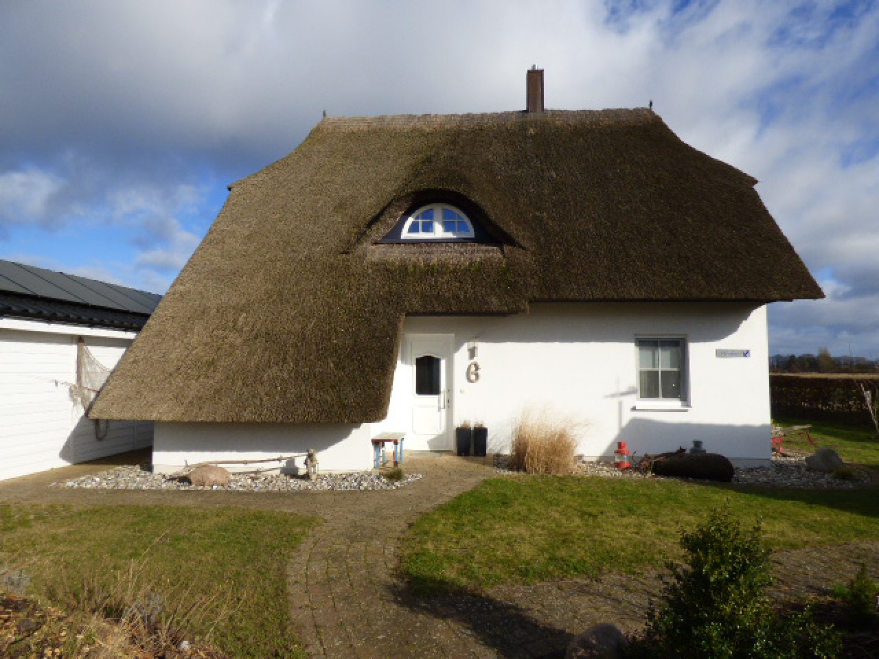 Reethaus zur Miete mit Sauna & Kamin & Balkon mit Blick zum Achterwasser