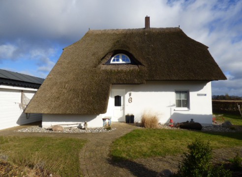 Reethaus zur Miete mit Sauna & Kamin & Balkon mit Blick zum Achterwasser